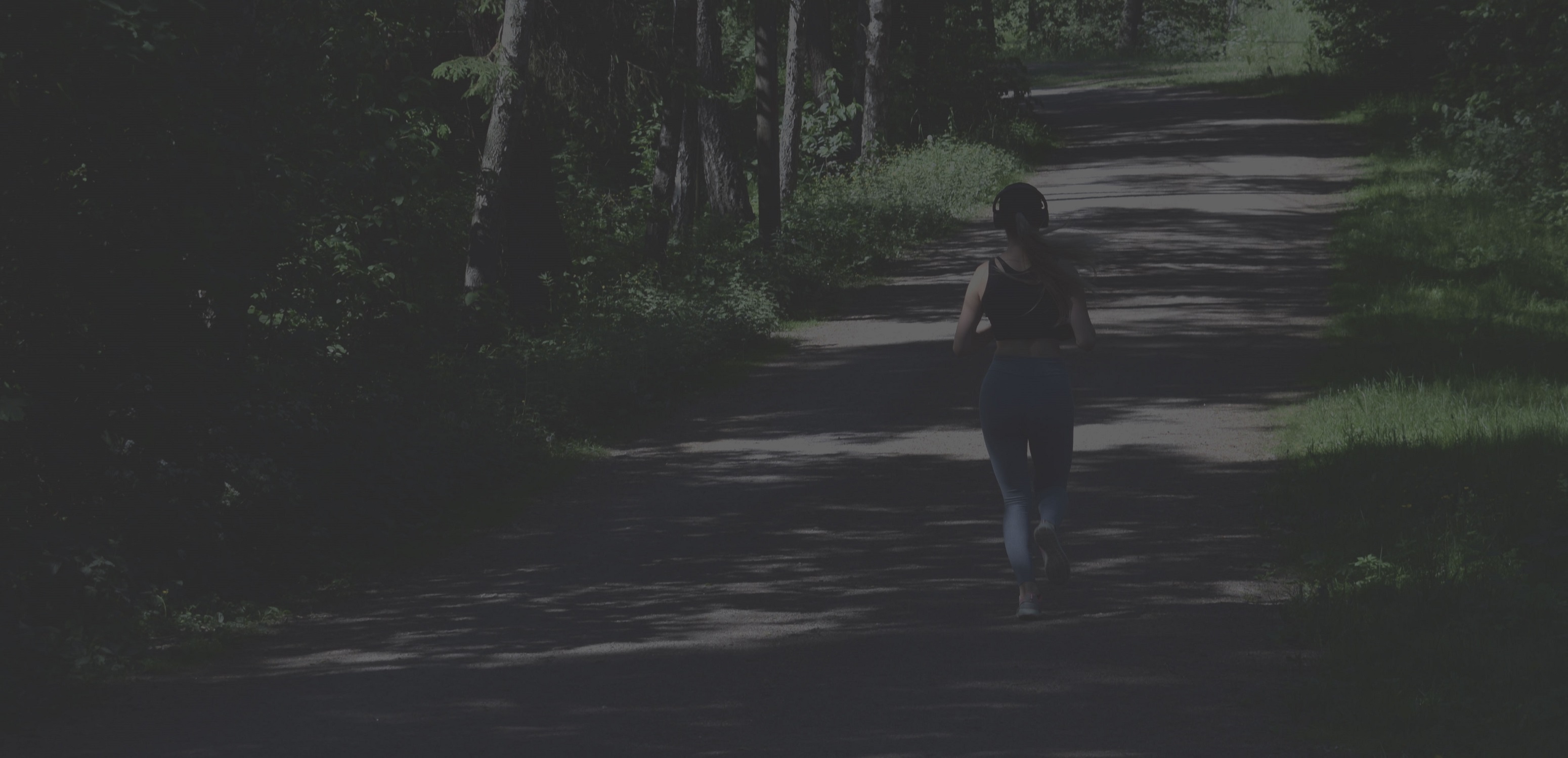 A photo of a woman jogging at Hobbs Farm